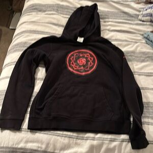 Portland thorns black hoodie with red print.
